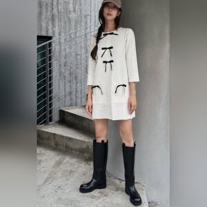 Elegant White Dress with Black Accents